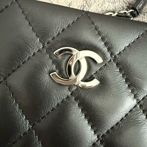 Chanel black with silver cross body